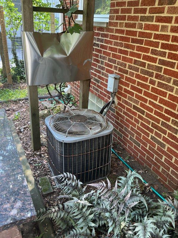 Completed HVAC system replacement estimate for residential property where existing WeatherMaker 8000 furnace and outdoor condensing unit are undersized due to home addition. Assessed current equipment capacity, measured ductwork configuration in basement mechanical room, and evaluated outdoor unit placement against brick exterior. Recommended properly sized replacement system to accommodate increased square footage and ensure adequate heating and cooling capacity for expanded living space.