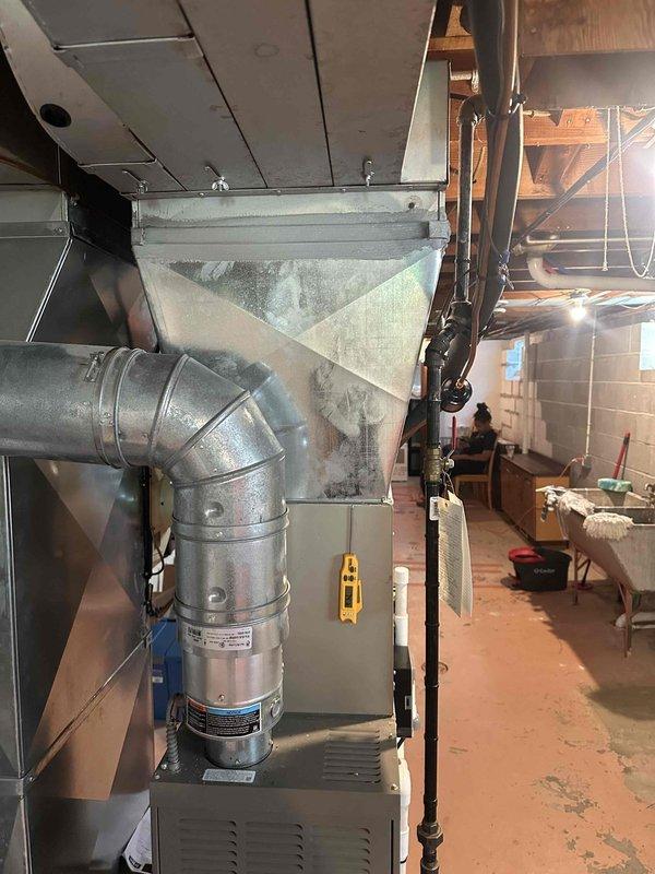 Completed full Bryant air conditioning system installation including new indoor evaporator coil mounted to existing furnace, outdoor condensing unit positioned on new equipment pad, electrical disconnect box for code compliance, and programmable thermostat for enhanced temperature control. All refrigerant lines were properly sized and insulated, electrical connections were made per manufacturer specifications, and system was tested for proper operation and cooling performance. Installation includes 10-year parts warranty and 1-year labor warranty.