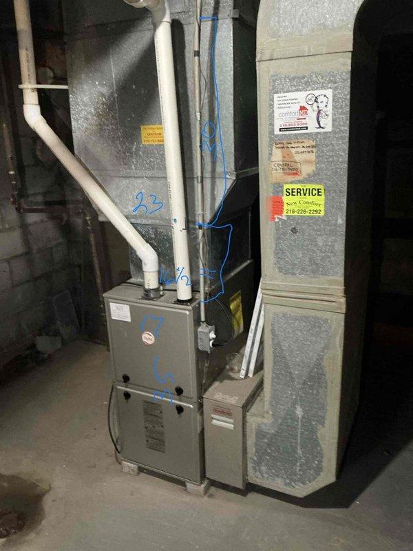 Completed estimate for add-on air conditioning system to existing furnace installation. Evaluated current heating equipment, existing electrical panel capacity with multiple circuits, and ductwork configuration in basement utility area to determine compatibility and requirements for AC integration. Assessed installation feasibility including condensate drainage routing, electrical service availability, and proper sizing requirements for cooling system addition to complement existing heating infrastructure.