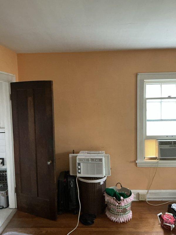 Conducted on-site assessment for mini split installation to replace existing window air conditioning units in residential space. Evaluated room layout, electrical requirements, and optimal placement for indoor unit mounting, marking proposed location on wall. Also performed estimate for gas line installation to service kitchen stove.