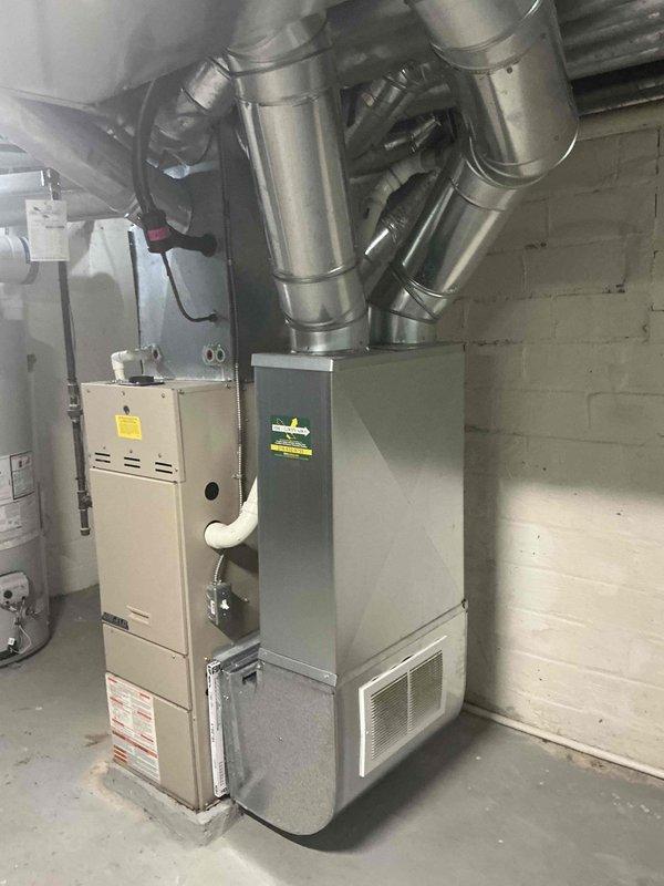 Conducted comprehensive estimate for complete HVAC system replacement at residential property. Evaluated existing furnace installation in basement utility area with connected ductwork system and outdoor AC condenser unit mounted against exterior wall. Documented current equipment configuration, assessed installation requirements, and provided replacement recommendations for both heating and cooling systems.