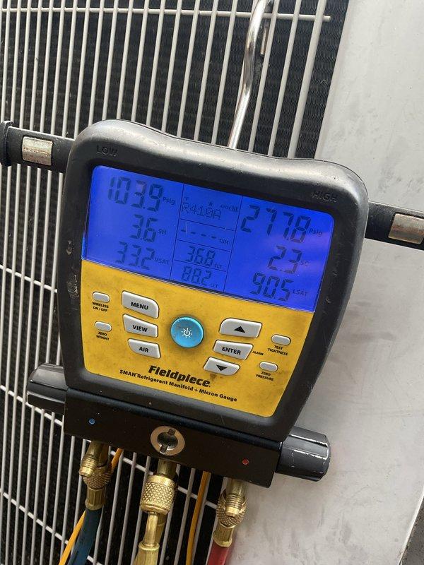 Performed scheduled tune-up maintenance on two residential air conditioning systems (5-year-old and 20-year-old units). Conducted comprehensive system diagnostics using refrigerant manifold gauges to verify proper refrigerant pressures and temperatures for R410A refrigerant. Measured operating pressures on both high and low sides, confirmed superheat and subcooling values within manufacturer specifications. Inspected condenser coils, verified proper airflow through heat exchanger fins, and confirmed both systems operating at optimal efficiency with no deficiencies noted.