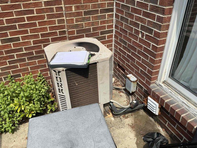 Conducted comprehensive HVAC replacement estimate for existing York outdoor condensing unit. Evaluated current system condition, noting standard installation on concrete pad with proper electrical disconnect and adequate clearance from structure. Assessed interior ductwork in basement area, identifying significant condensation issues on flexible metallic supply duct indicating potential insulation deficiency or excessive temperature differential. Documented equipment specifications, installation configuration, and existing ductwork conditions. Provided replacement recommendations addressing both exterior unit upgrade and interior moisture control improvements to ensure optimal system performance and efficiency.