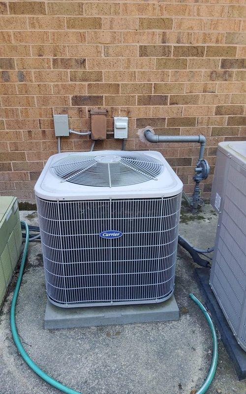 Completed comprehensive preventative maintenance on an 11-year-old Carrier air conditioning system. Upon arrival, verified system was operating properly with no reported issues. Performed complete AC tune-up including inspection of outdoor condenser unit, electrical connections, and disconnect switch. Checked refrigerant levels, cleaned condenser coils, inspected condensate drain line, and verified proper airflow through the unit. Tested all electrical components including contactors, capacitors, and safety controls. Measured temperature differential and confirmed system performance within manufacturer specifications. All components found to be in good working condition with no immediate repairs required. System left operating efficiently and ready for continued cooling season use.