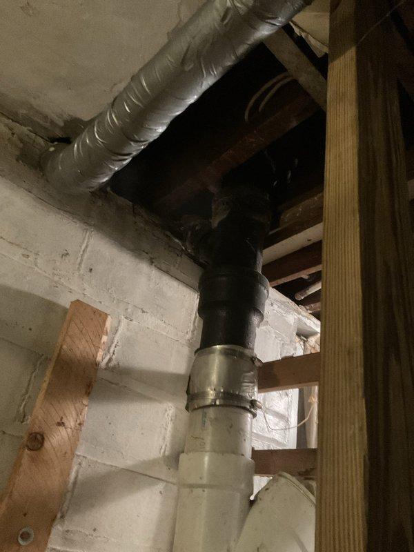 Completed comprehensive plumbing assessment in residential property requiring difficult access to equipment located in attic/crawl space area. Two-person crew relocated homeowner belongings to access vertical cast iron waste stack with blue shut-off valve and transitioned PVC connections secured with metal hose clamps. Acquired necessary permit and installed miscellaneous materials to complete repair work on plumbing infrastructure within exposed framing area.