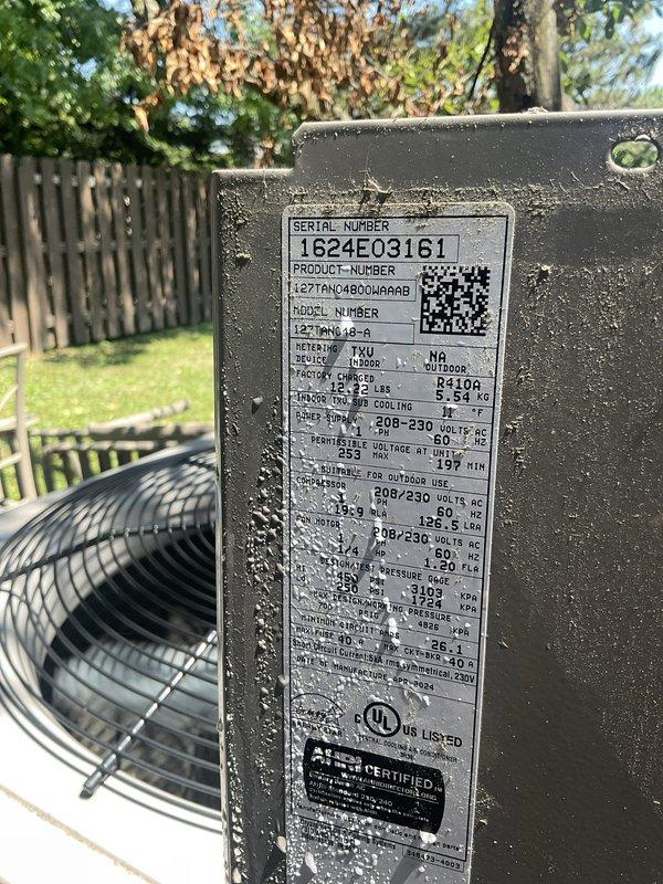 Performed comprehensive tune-up on 3-year-old residential air conditioning system. Inspected Carrier 5.54-ton outdoor condensing unit (Model T2TPNC48A6R) utilizing R-410A refrigerant and matched air handler. System found operating within manufacturer specifications with no deficiencies noted. Verified electrical connections, refrigerant charge, and overall system performance. Unit cleaned and confirmed ready for continued service.