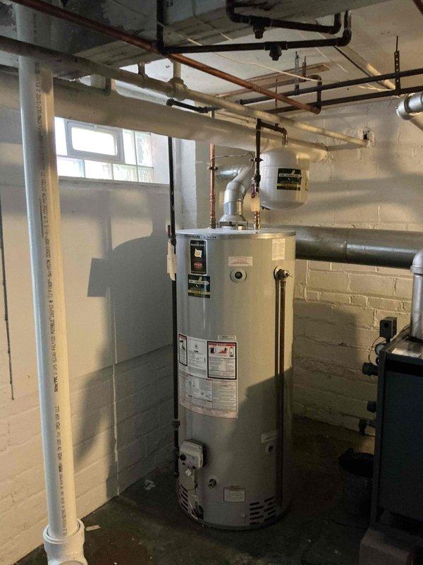 Conducted estimate for replacement of approximately 25-year-old steam boiler system currently in operation. Evaluated existing equipment and discussed power vent conversion options as an alternative to traditional chimney venting, per customer's preference and willingness to eliminate existing chimney infrastructure. Documented current boiler configuration, piping network including copper and black iron steam lines, and existing venting arrangement to provide comprehensive replacement options and specifications.