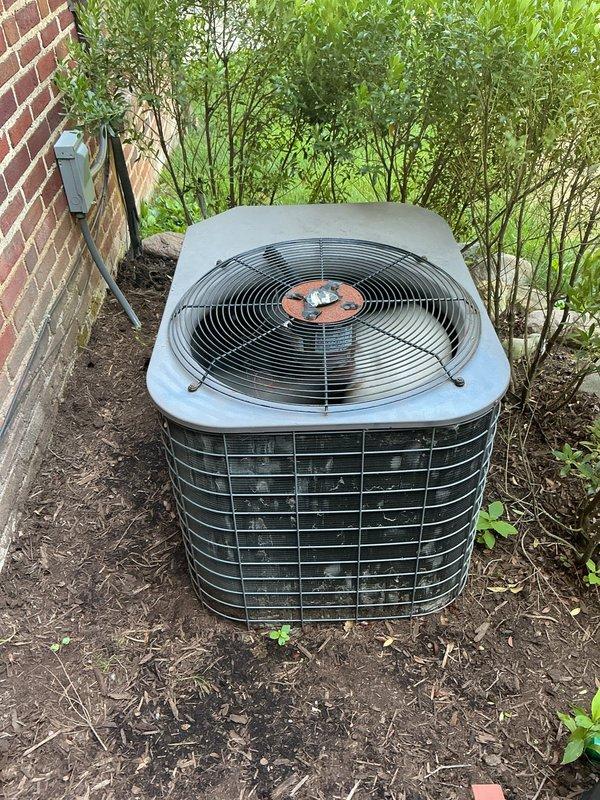 Completed estimate for full HVAC system replacement of approximately 20-year-old equipment. Assessed existing outdoor condenser unit with louvered venting and attic-mounted Luxaire air handler with associated ductwork, condensate drainage system, and auxiliary pump. Documented current system configuration including flexible metallic ductwork, PVC condensate lines, and electrical disconnect for replacement specifications.