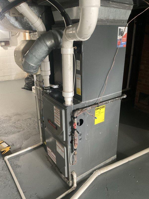 Performed comprehensive AC tune-up on 4-year-old Goodman air conditioning system with no reported operational issues. Completed standard preventative maintenance procedures including inspection of outdoor condenser unit, indoor air handler components, refrigerant lines, electrical connections, and condensate drainage system. All components found operating within normal parameters with system maintaining proper cooling function.