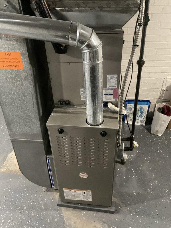 Responded to no cooling complaint on one-year-old Carrier central air conditioning system affecting entire residence. Upon arrival, performed comprehensive system diagnostics including refrigerant charge verification, electrical component testing, and airflow assessment at both indoor air handler and outdoor condensing unit. Documented equipment conditions with photographs showing Carrier furnace with evaporator coil installation in basement mechanical room, noting clean installation with proper clearances and accessible service access points. Completed diagnostic evaluation and identified root cause of cooling failure, restoring system to proper operation with normal temperature differential and adequate airflow throughout residence.