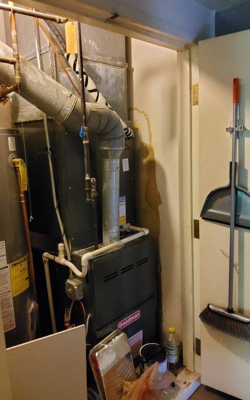 Responded to service call for 9-year-old central air conditioning system not cooling. Upon inspection of rooftop condenser unit and indoor Goodman furnace/air handler, diagnosed and resolved cooling issue. System tested and confirmed operational with proper airflow and refrigerant cycling restored.