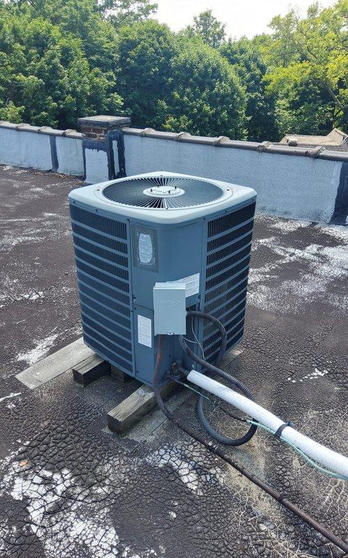 Responded to service call for 9-year-old central air conditioning system not cooling. Upon inspection of rooftop condenser unit and indoor Goodman furnace/air handler, diagnosed and resolved cooling issue. System tested and confirmed operational with proper airflow and refrigerant cycling restored.