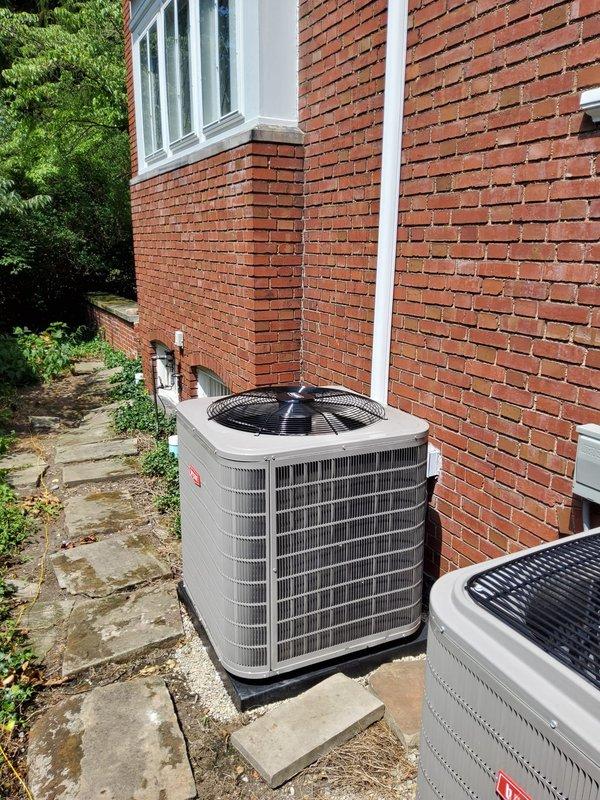 Completed full Unico system replacement including new coil, blower assembly, and air conditioning condenser units. Installed dual exterior condensers on concrete pads with proper clearances and electrical connections. Replaced air handler with new equipment positioned in mechanical room, installed Ecobee smart thermostat for improved climate control. Extended ductwork by adding five new supply runs to improve coverage—four runs installed in attic space and one additional run on second floor to address previously underserved areas. All refrigerant lines, electrical connections, and condensate drainage properly installed and tested. System commissioned and verified operational.
