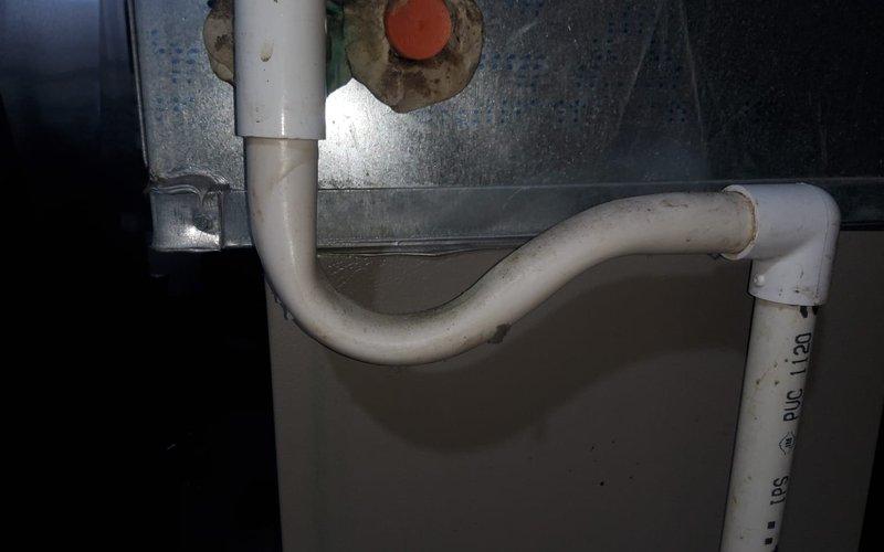 Performed comprehensive air conditioning tune-up on approximately 30-year-old residential cooling system that was operating properly at time of service. Conducted standard preventive maintenance procedures including inspection of indoor air handler unit, furnace cabinet, condensate drain trap and piping system, ductwork connections, and outdoor condenser unit. Verified all components functioning within normal parameters and system ready for continued operation.