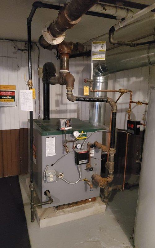 Completed installation of Nest thermostat on 9-year-old boiler system. Assessed existing wiring configuration at terminal block and determined common wire requirements. Successfully integrated Nest Power Connector to provide adequate power supply for thermostat operation, ensuring compatibility with boiler control system and proper communication between thermostat and heating equipment.