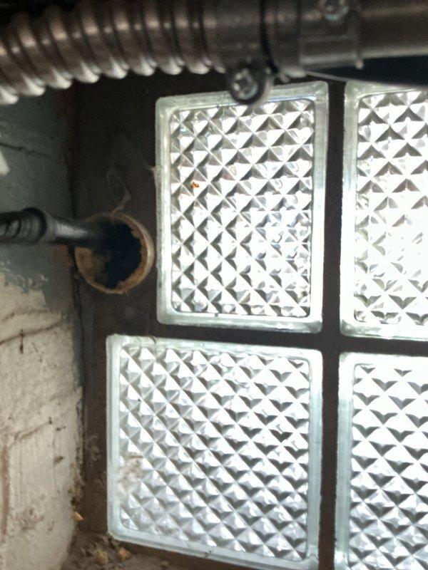Conducted comprehensive assessment of existing HVAC system for complete replacement estimate. Evaluated 20+ year old gas furnace and air conditioning unit that have reached end of serviceable life. Documented electrical panel configuration and basement utility area conditions, including existing ductwork routing and glass block window placement. Photographed circuit breaker panel to verify electrical capacity for new equipment installation and assessed flexible ductwork condition in mechanical space. Provided detailed replacement estimate for new high-efficiency gas furnace and AC system to customer for approval.