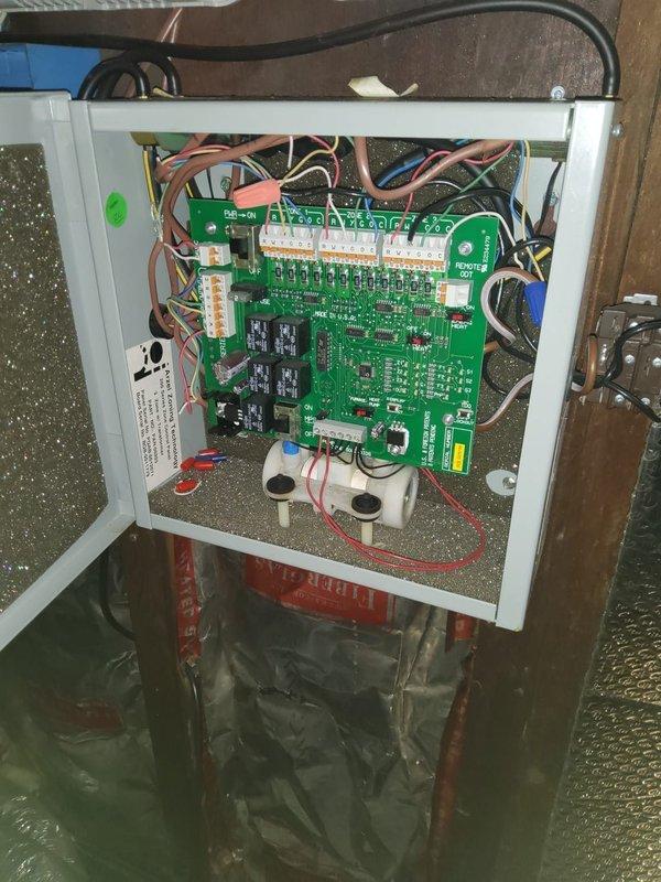 Responded to no-cooling call on 16-year-old air conditioning system with thermostat displaying service alert. Upon inspection, diagnosed failed control board in multi-zone HVAC system. Replaced defective circuit board, verified proper wire connections at terminal blocks, tested zone control modules, and confirmed system operation restored with all zones functioning correctly.