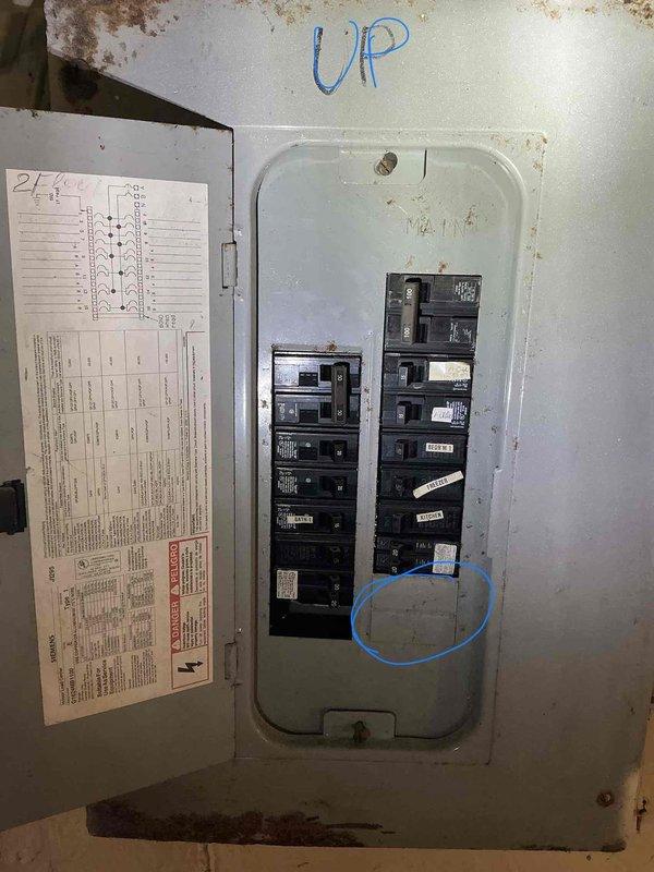 Conducted on-site evaluation for adding air conditioning system to existing residential property. Assessed current electrical panel capacity and existing dual furnace setup in unfinished basement area to determine compatibility and requirements for AC installation. Documented electrical service panel condition and current HVAC infrastructure including ductwork routing and equipment placement for integration planning.