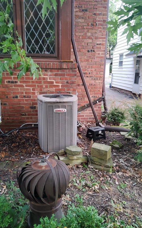 Completed preventive maintenance tune-up on two 20-year-old outdoor air conditioning systems. Inspected both units, including electrical components, capacitors showing weathering and corrosion, wiring connections, and condensing units mounted on concrete pads. Performed standard maintenance procedures, documented equipment condition with photos, and verified both systems operational upon completion.