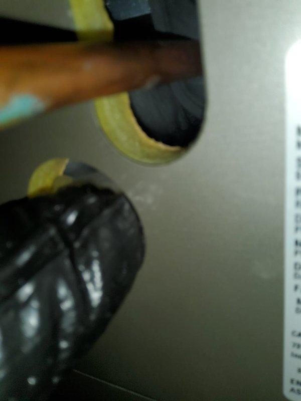 Responded to service call for air conditioning system not operating properly, affecting entire home. Upon arrival, performed comprehensive system inspection of less than one-year-old unit. Examined outdoor condensing unit, verifying proper installation on concrete pad with adequate drainage configuration via PVC condensate lines and P-trap assembly. Inspected indoor components including refrigerant line sets with foam insulation and associated ductwork connections. Conducted operational testing of system components, checked refrigerant pressures, verified electrical connections, and assessed airflow throughout system. Documented equipment condition with photographs for service records. System restored to proper working order and homeowner advised of findings.