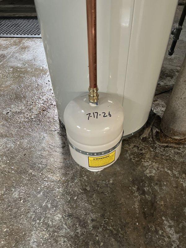 Installed thermal expansion tank on water heater system to protect against excessive pressure buildup from thermal expansion. Added proper bonding connections to gas piping system to ensure electrical continuity and meet code requirements for safe grounding of metallic gas lines. Both installations enhance system safety and bring the water heater installation into compliance with current plumbing codes.