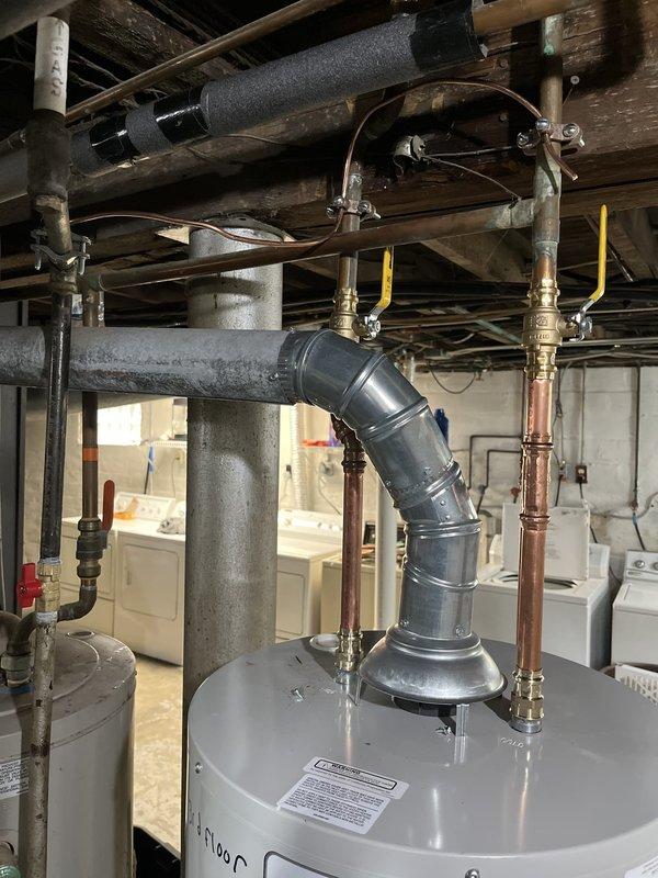 Installed thermal expansion tank on water heater system to protect against excessive pressure buildup from thermal expansion. Added proper bonding connections to gas piping system to ensure electrical continuity and meet code requirements for safe grounding of metallic gas lines. Both installations enhance system safety and bring the water heater installation into compliance with current plumbing codes.