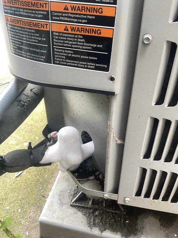 Responded to service call for second-floor cooling issue with right-side 120 SC condenser unit failing to activate. Inspected outdoor condensing unit, verified electrical connections and refrigerant line integrity, and documented equipment condition with warning labels and model identification clearly visible. Unit operational status assessed and system components photographed for service records.