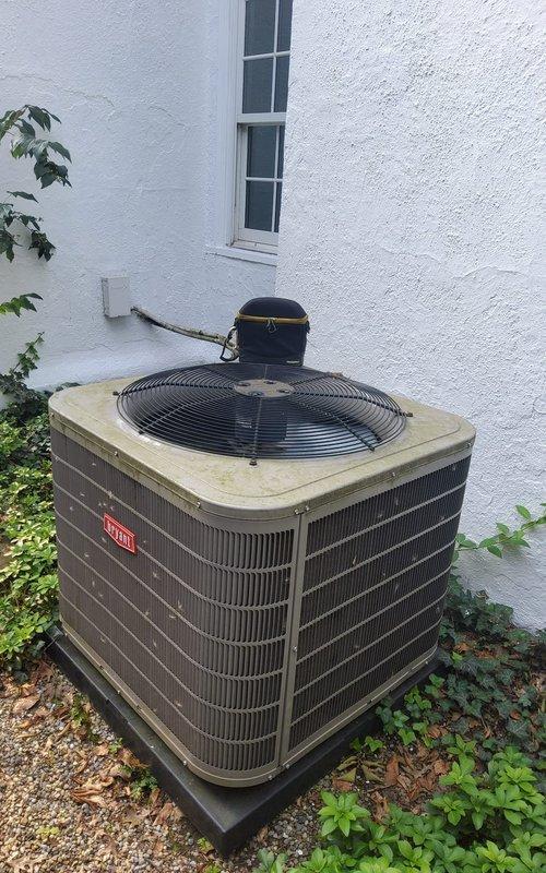Completed comprehensive AC tune-up on Bryant outdoor condensing unit and indoor air handler system. Performed thorough inspection of air filtration system and filter housing as requested, confirming proper fit, seal, and operational functionality. Verified FieldControls Healthy Home System air purification unit mounted in mechanical space is operating correctly with blue indicator light illuminated, confirming active air quality management. Conducted full preventive maintenance protocol including visual inspection of outdoor condenser coils, electrical connections, and refrigerant lines, with all components found in satisfactory working condition.