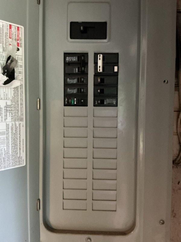 Conducted on-site assessment for mini-split installation in bedroom. Evaluated electrical panel capacity and confirmed adequate breaker availability for new system. Measured and marked proposed indoor unit location on wall above bed at 9-foot height to ensure optimal air distribution and coverage for the space.
