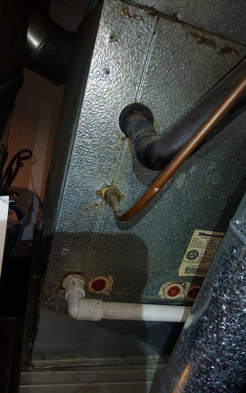 Performed annual tune-up on 20-year-old air conditioning system with customer reporting reduced cooling performance as of that morning. Completed comprehensive inspection of indoor and outdoor components, including furnace, ductwork, refrigerant lines, and condensate drainage system. System found operational with all connections secure; provided maintenance recommendations given age of equipment.