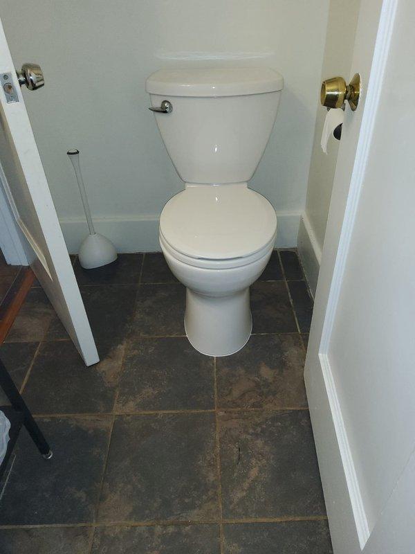 Responded to water leak call at century-old residential property. Inspected plumbing system throughout home, including basement mechanical room with exposed PVC drainage lines, water heater connections, and bathroom fixtures. Documented conditions with photographs showing plumbing infrastructure and potential leak sources in aging system.