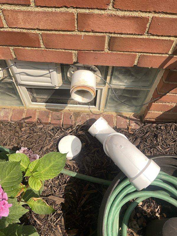 Completed routine AC tune-up on ten-year-old exterior condensing unit. Performed standard maintenance including inspection of electrical connections, refrigerant levels, and operational testing. Identified cracked PVC ventilation pipe at exterior foundation with visible weathering and rust staining at joints; documented condition with photos and advised customer of recommended repair to prevent further deterioration and potential system efficiency issues.