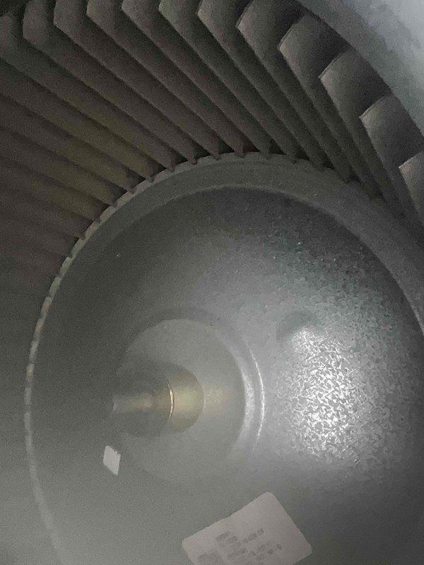 Performed routine AC tune-up on residential system. Inspected blower motor and fan assembly, confirmed proper operation. Checked refrigerant pressures using manifold gauges, recorded readings within manufacturer specifications. System operating normally with no issues found during maintenance inspection.