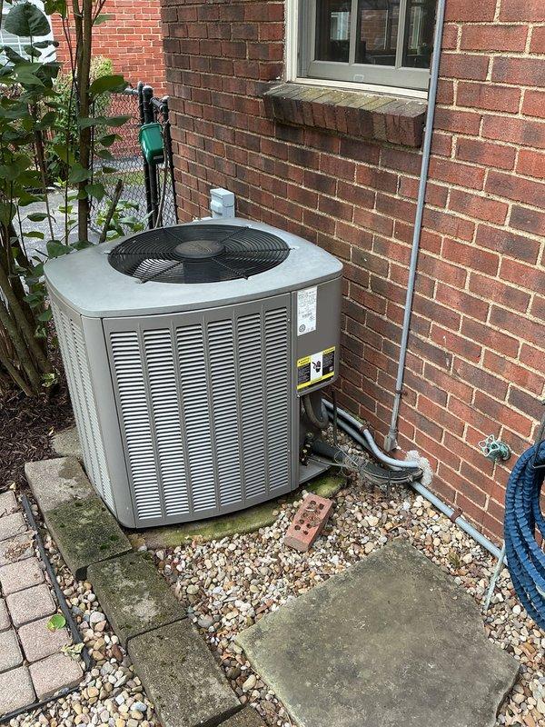 Completed comprehensive estimate for full HVAC system replacement of 19-year-old equipment. Evaluated existing Lennox furnace installation in basement with Schedule 40 PVC venting system and associated ductwork, along with outdoor condenser unit positioned on weathered concrete pad against brick exterior. Documented current system configuration including refrigerant lines, electrical connections, condensate drainage, and overall equipment condition to provide replacement recommendations and specifications.