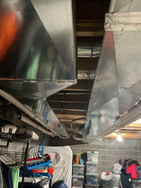 Conducted comprehensive assessment of HVAC system that sustained water damage in basement mechanical room. Evaluated existing ductwork installation, including main trunk lines and branch ducts showing visible deterioration and discoloration from water exposure. Prepared replacement estimate covering affected sheet metal ductwork components, associated mechanical connections, and necessary modifications to restore system to proper operating condition per manufacturer specifications and local code requirements.