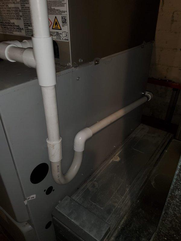 Completed full Bryant HVAC system installation including new outdoor condensing unit, indoor evaporator coil, condenser pad, electrical disconnect box, and programmable thermostat. Integrated new equipment with existing condensate pump and filtration system, ensuring proper refrigerant charging, electrical connections, and ductwork sealing. System tested and verified operational with 10-year parts and 1-year labor warranty coverage.