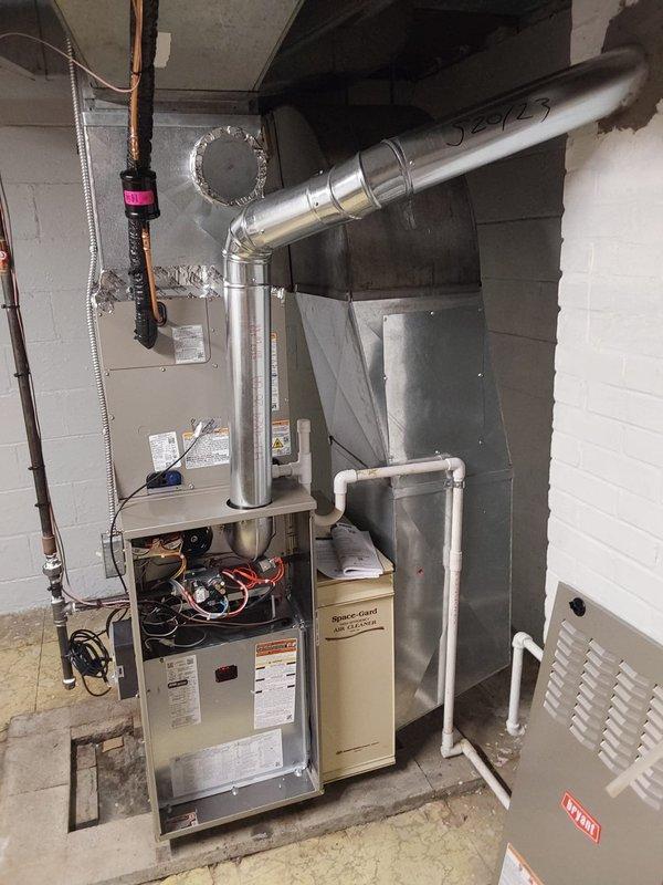 Completed full HVAC system replacement including installation of new Bryant 80% efficiency two-stage gas furnace with variable speed blower motor and new Bryant air conditioning system with matching evaporator coil. Installed new outdoor condenser unit on dedicated pad on right side of residence, new electrical disconnect box, and programmable thermostat. Relocated condenser to side of home and ran new thermostat wire from furnace to outdoor unit. Connected refrigerant line set with proper insulation and established all electrical connections to code. System tested and verified operational with proper airflow, temperature differential, and refrigerant charge. All warranty documentation provided: 10-year parts, 5-year labor coverage.