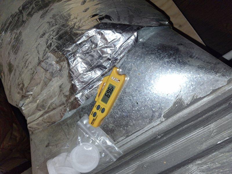Responded to no cooling complaint on 3-year-old air conditioning system. Upon arrival, performed diagnostic testing of the cooling system using calibrated digital measurement tools. Conducted thorough inspection of ductwork in attic space, measuring temperature differentials at multiple points along the supply ducts to identify system performance issues. Found flexible and rigid ductwork sections with proper insulation intact. Recorded temperature readings of 351°F at supply duct locations to verify system operation. Tested airflow distribution through duct system and confirmed proper sealing at connection points. Completed diagnostic assessment of entire cooling system including attic-mounted ductwork components. Documented findings with photographic evidence showing measurement readings and duct conditions. System operational upon completion of service call.