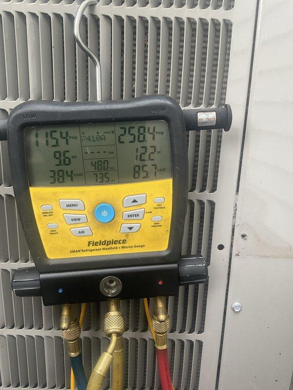 Performed comprehensive preventive maintenance on a 6-year-old residential air conditioning system. Conducted complete system diagnostics using refrigerant manifold gauges to verify proper operating pressures and temperatures across the R-410A refrigerant circuit. Measured superheat and subcool values to confirm optimal refrigerant charge and system performance. Inspected condenser coil fins for debris and damage, verified proper airflow across heat exchanger. System operating within manufacturer specifications with no deficiencies noted. All readings normal for ambient conditions. Unit functioning properly with no repairs required.