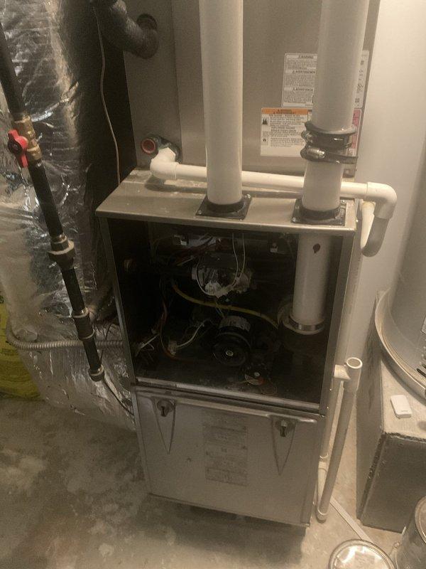 Completed comprehensive air conditioning tune-up on 4-year-old residential split system. Inspected indoor air handler unit including blower motor assembly, electrical connections, and condensate drainage system; verified proper operation of all internal components. Performed outdoor condenser unit inspection, checked refrigerant pressures, cleaned coils, and confirmed system specifications match manufacturer ratings for R-410A refrigerant. All components operating within normal parameters with no issues identified; system performing efficiently with no service recommendations required at this time.