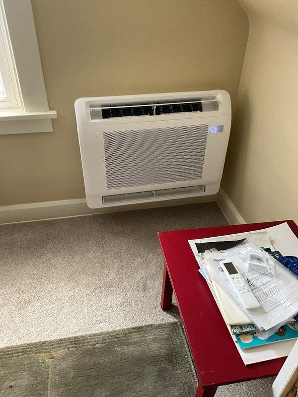 Successfully installed a new Bryant 4-zone ductless mini split heat pump system with three wall-mounted indoor units in the kitchen, master bedroom, and guest bedroom, plus one console-style unit in the third-floor bedroom. The outdoor condenser was positioned behind the deck on a mounting pad as specified. Ran new copper refrigerant lines, communicating wires, and condensate drains from the outdoor unit to all four indoor units, enclosing all linesets with plastic linehide material for a finished appearance. Installed new dedicated electrical circuit from the main electrical panel to the outdoor condenser to provide proper power supply for system operation. All indoor units mounted securely with remote controls and documentation provided for operation.