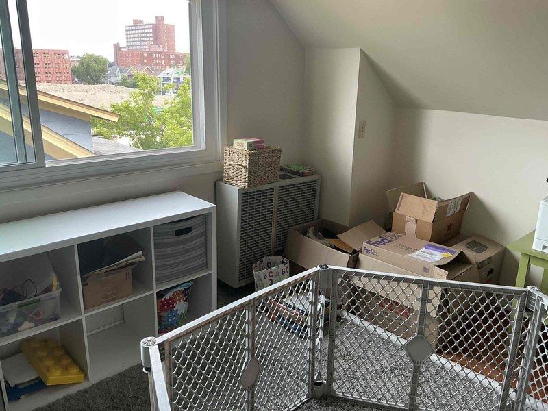 Completed estimate for add-on mini split air conditioning system installation in upper floor attic space. Assessed electrical panel capacity in basement utility room and confirmed adequate breaker availability for new mini split circuit. Evaluated installation location in sloped ceiling room with existing storage configuration and determined optimal placement for indoor unit to provide effective cooling coverage.