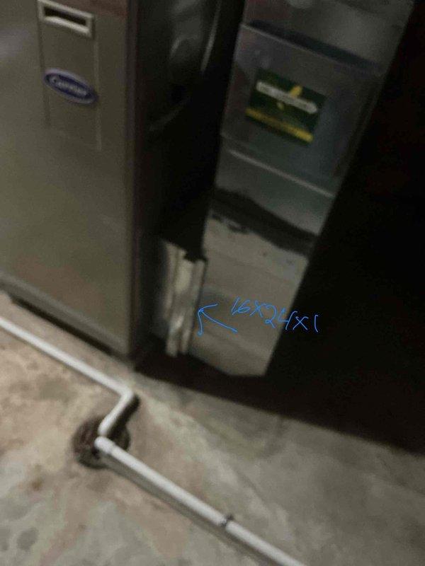 Responded to service call for 16-year-old Carrier central air conditioning system experiencing inadequate cooling and intermittent freezing of refrigerant line entering air handler, resulting in water accumulation. Conducted comprehensive system evaluation including inspection of indoor air handler unit and associated components, documented equipment condition with photographic evidence showing dual-cabinet configuration with visible service markings, PVC condensate drainage system, and refrigerant line connections. After thorough assessment of aging system performance issues and recurring freeze-up conditions, provided customer with complete replacement estimate for new HVAC system installation to resolve chronic operational deficiencies and restore proper climate control functionality.