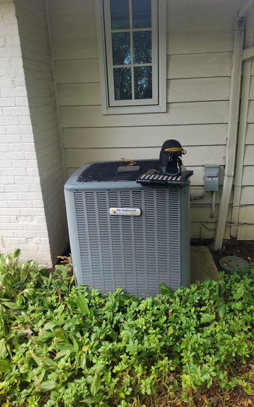 Performed preventative maintenance on two 20-year-old residential air conditioning units. Both outdoor condensers were inspected, coils cleaned, and operational parameters verified under partly cloudy conditions with ambient temperature of 81°F. Customer was advised regarding MVP renewal options for both cooling and heating systems to maintain warranty coverage and ensure continued reliable operation.