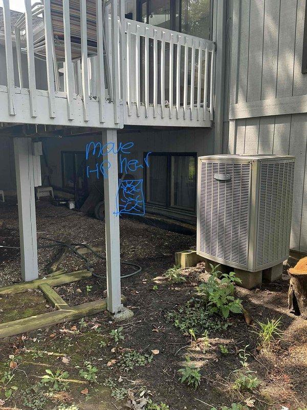 Responded to estimate request for residential HVAC system experiencing refrigerant leak. Evaluated existing outdoor heat pump unit located beneath elevated deck structure and documented current system condition with photographic evidence. Provided comprehensive replacement quote reference number 2377 for new equipment installation.