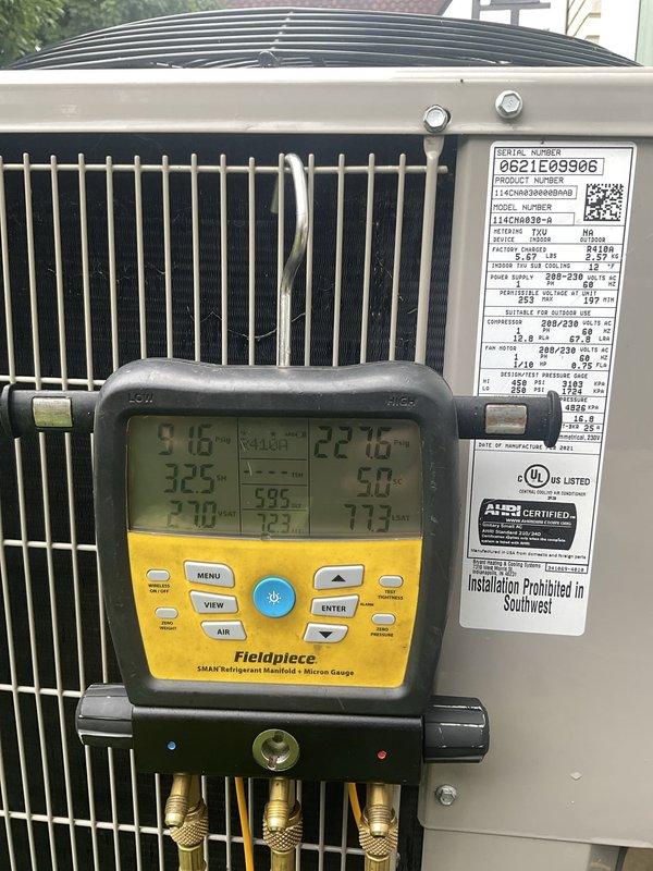 Returned to system after unit thawed from previous frozen condition. Performed diagnostic testing using digital manifold gauges, recording superheat and subcooling measurements along with system pressures and temperatures. Utilized electronic refrigerant scale to verify proper refrigerant charge levels and assess system performance parameters.