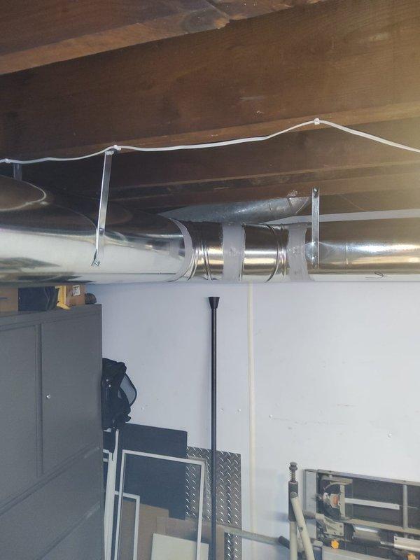 Completed installation of two Bryant 97% high-efficiency gas furnaces for duplex property, each featuring single-stage heating with multi-speed ECM blower motors. Installed new programmable thermostats and condensate pumps for both units to handle high-efficiency condensation removal. Fabricated and installed return air ductwork to enclose previously open returns, bringing system into compliance with current municipal building codes. All ductwork connections secured with proper supports and fasteners, electrical conduit run to code specifications, and units tested for proper operation and safety.