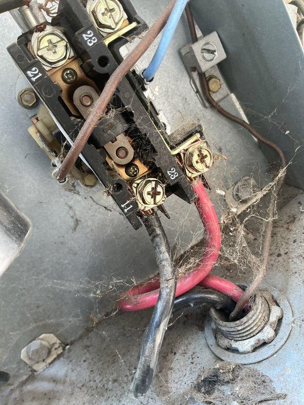 Performed comprehensive AC tune-up on existing residential system. Conducted full system inspection including electrical connections at contactor assembly, cleaned accumulated dust and debris from terminal block and wiring connections, and inspected blower wheel assembly for proper operation. All components found to be functioning within normal parameters; system operational and ready for continued service.
