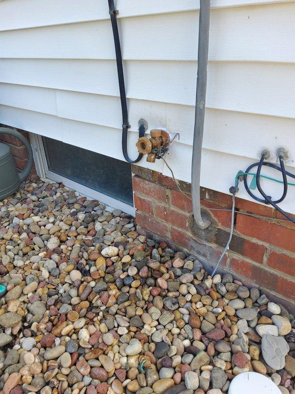 Responded to emergency plumbing repair for damaged exterior hose bib that sustained a cracked pipe during hose removal, causing water intrusion into basement. Replaced the compromised outdoor faucet assembly and associated copper piping, installed new frost-free sillcock with proper mounting to exterior siding, and verified all connections were secure with no leaks. Restored water service to the exterior line and confirmed proper operation of the new fixture.