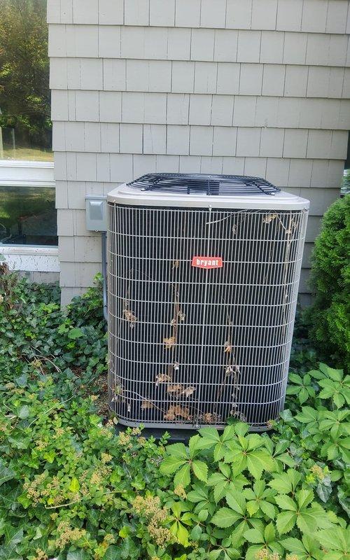 Completed routine AC tune-up and preventative maintenance on residential cooling system. Performed comprehensive inspection of outdoor condenser unit, including cleaning of debris from exterior grille, verification of proper refrigerant levels, and assessment of electrical connections. Inspected indoor Bryant furnace and evaporator coil assembly, replaced air filter, and verified proper airflow through ductwork system to ensure optimal system performance for the cooling season.